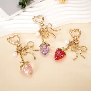 New Ins Alloy Bow Decorative Keychain Bundle Set - Versatile Niche Strawberry Pendant for Mobile Phone Lanyard, Bag Accessory