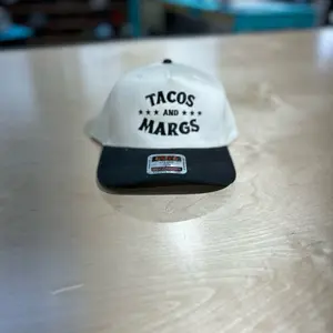 Tacos and Margs Hat with Black Brim and White Crown, Featuring a Bold Print Design