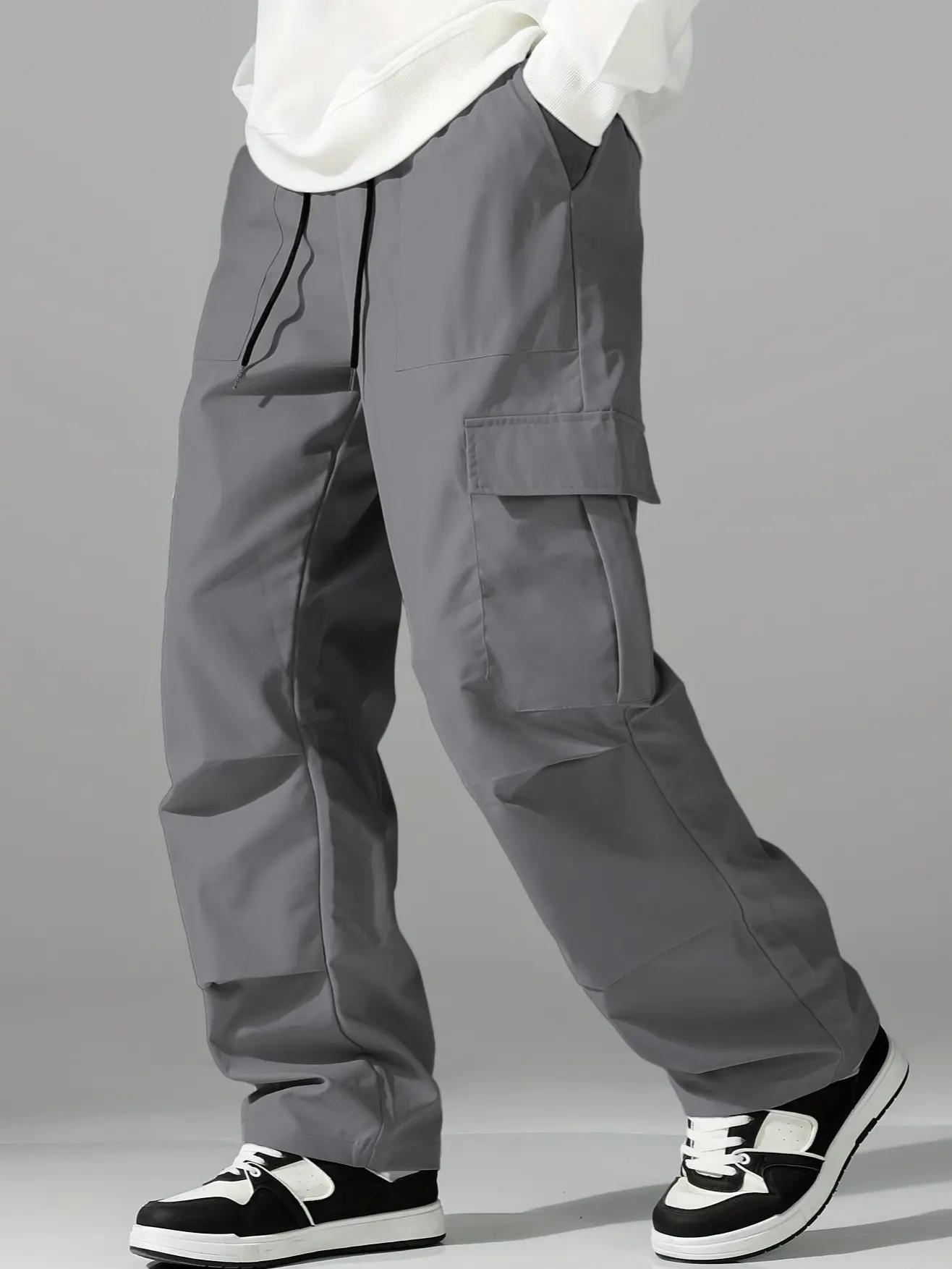 Men’s wide-leg cargo pants, loose practical long pants, street-style cargo trousers, lightweight outdoor pants, drawstring waist work pants, multi-pocket cargo pants, men’s casual street-style pants, loose and comfortable for everyday wear