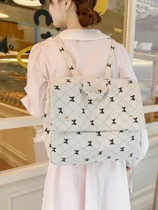 2025 Autumn & Winter Fashion New Retro Commuter Backpack for Women, Corduroy with Cute Bowknot Print, Messenger Bag Style, Suitable for Junior High, Senior High College Students, Minimalist, Large-Capacity, Waterproof Backpack