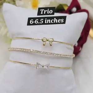 TRIO DE ESCLAVAS ABIERTAS ...SIZE 6-6.5 INCHES . LAMINADO 14K
