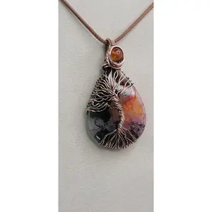 Garden Quartz ( dyed ) wrapped in copper, with carnelian accent