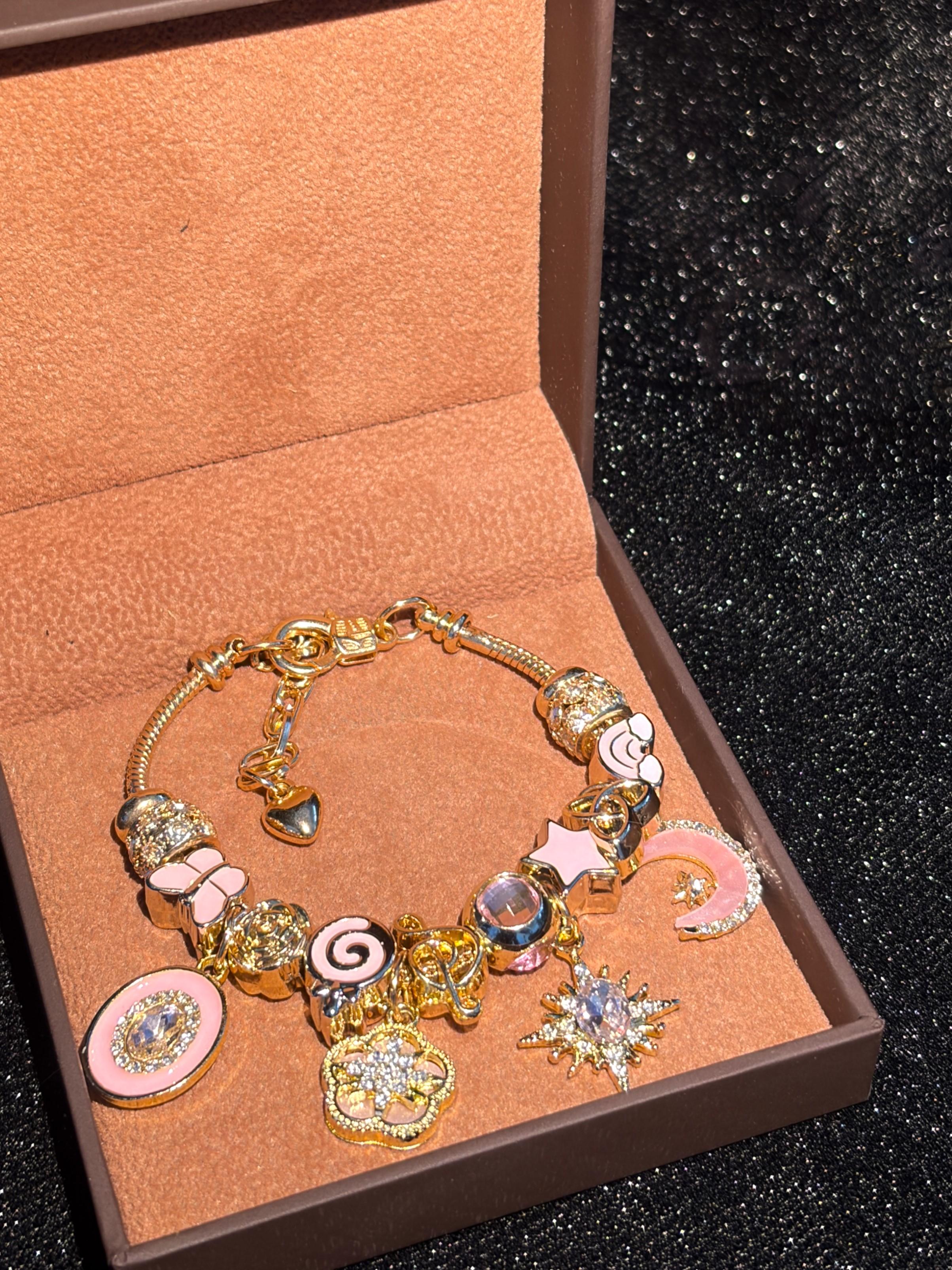 Women's Pink Gold Enamel Charm Bracelet - Gold-Tone Adjustable Snake Chain with Sun, Star-Burst, Lollipop, Music Note, Heart Dangle Charms, Rhinestone Fashion Jewelry Gift for Teen Girls Women's Pink Gold Enamel Charm Bracelet - Gold-Tone Adjustable Snake Chain with Sun, Star-Burst, Lollipop, Music Note, Heart Dangle Charms, Rhinestone Fashion Jewelry Gift for Teen Girls