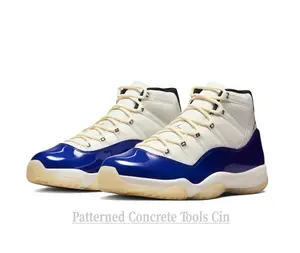 Premium white mesh with that iconic blue patent detail. A total grail