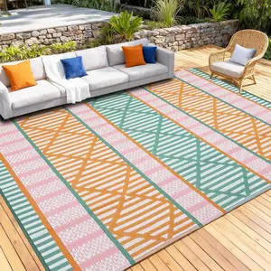 9x12 Reversible Outdoor Rug for Patio & Deck, Waterproof Camping Mat for RV, Backyard, Balcony, Porch, Lightweight Plastic Carpet, UV Resistant, Easy to Clean, Travel Friendly, Red Green Pink White
