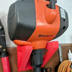 Weed eater wall mount, 3D printed, mounts to studs and holds gas weed eater string trimmer