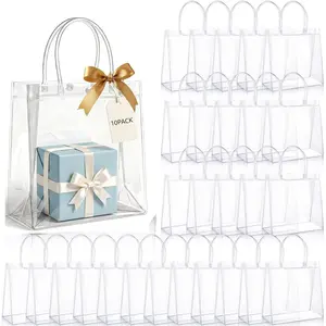 Set of 10 Transparent Plastic Gift Bags with Handles, with 10pcs Champagne Color Ribbon, Waterproof Reusable PVC, Perfect for Halloween, Christmas, Mother's Day, Teacher's Day, Valentine's Day, premium gifts for weddings, birthdays parties.