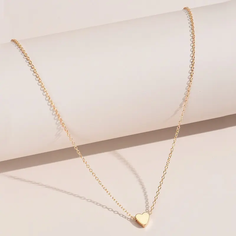 Golden heart shaped pendant necklace # X