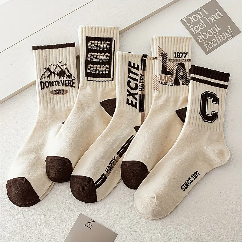 5 pairs of fashionable letter printed anti odor and sweat absorbing socks for men and women, comfortable and breathable, suitable for daily wear, sports, and travel
