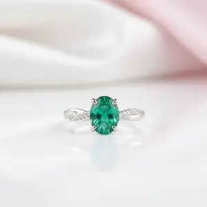 Twist Yellow Gold Emerald Green Oval Cut Engagement Ring