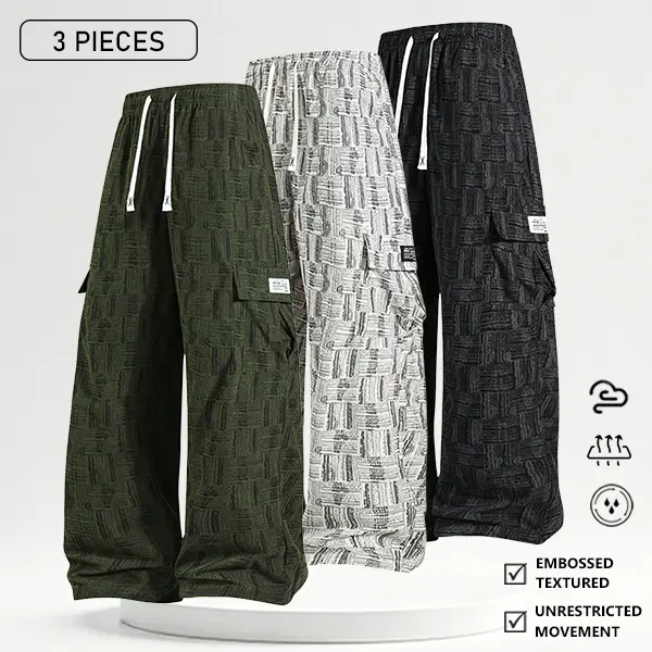 Men’s everyday wear performance fabric long pants, available individually or in multi-pack options; wide-leg, straight-cut design with large side pockets; loose, casual streetwear bottoms, available in multiple colors.
