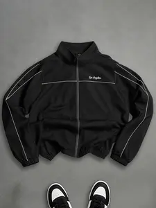 Single piece American street-style stand-collar sports jacket—versatile and slimming, with a loose drop-shoulder silhouette and color-matched elastic ribbed cuffs that prevent it from blowing up in wind.