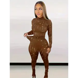 Sexy cut-out two-piece set featuring a mock-neck top and skinny pants; women’s clothing suit with white sleeves; casual bottom.