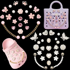 IVASKY 24PCS Elegant Pink or White Pearl Bling Coquette Shoe Charms Set for Croc and Jibbit – Butterfly Flower Crown Chain Trendy Hole Shoes Accessories Shoe Kit Character Cartoon jewelry accessory shoe decoration charms Charm Pack for Women silver plain