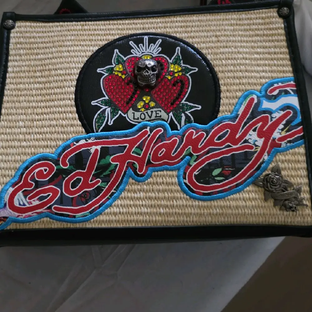 Ed Hardy's Tattoo Art Handbag with Tiger and Lotus Design - Stylish and Unique Fashion Accessory   pick 1-5 Exclusive Viral new w/tags @glos.vibe @stayfadedbrand #stayfaded #stayfadedbrand #glosvibe