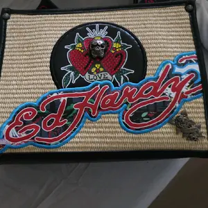 Ed Hardy's Tattoo Art Handbag with Tiger and Lotus Design - Stylish and Unique Fashion Accessory   pick 1-5 Exclusive Viral new w/tags @glos.vibe @stayfadedbrand #stayfaded #stayfadedbrand #glosvibe