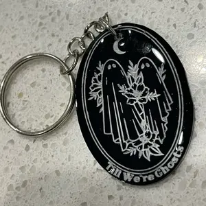 Till We’re Ghosts Keychain with Black Background and White Design, Featuring Gothic Elements and Chain Attachment