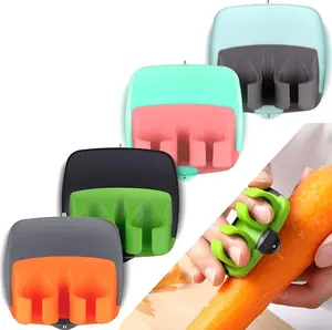 4PCS Finger Grip Vegetable & Fruit Peelers – Comfortable Palm Peeling Tools for Potato, Carrot, Apple & Cucumber
