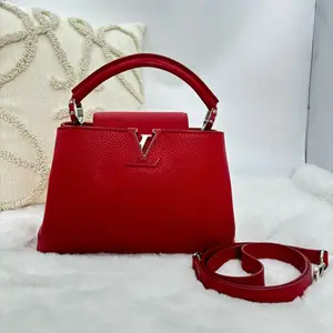 Pre-owned Louis Vuitton Taurillon Mini Capucines Scarlet WWL