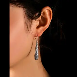 Textured Waterdrop Earrings - Elegant Design with Unique Patterns and Clear Accents