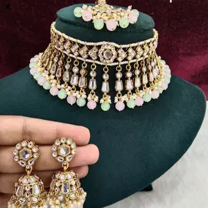Premium Quality Chokar Set with Earrings and Tikka Featuring Intricate Gemstone Design