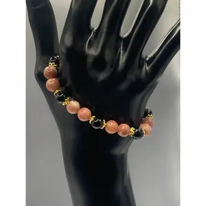 Black obsidian with pink lepidolite semi precious stone/crystal beaded elastic bracelet with gold plated flower bead caps