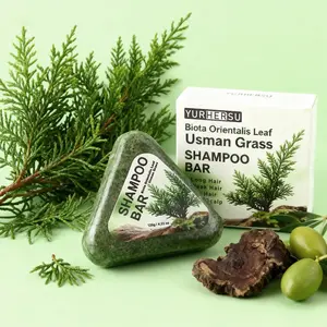 Usman Grass and Arborvitae Shampoo Bar, a smooth, triangular shampoo bar, deeply moisturizes herbal soap, deeply cleanses and removes odor, smooths frizz, adds elasticity, thickens hair, has a fresh scent, is easy to carry, and makes a great holiday gift.