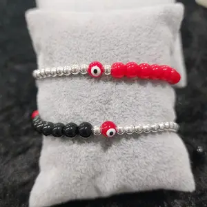 Pulsera ojo rojo y negro.Red and black eye bracelet.