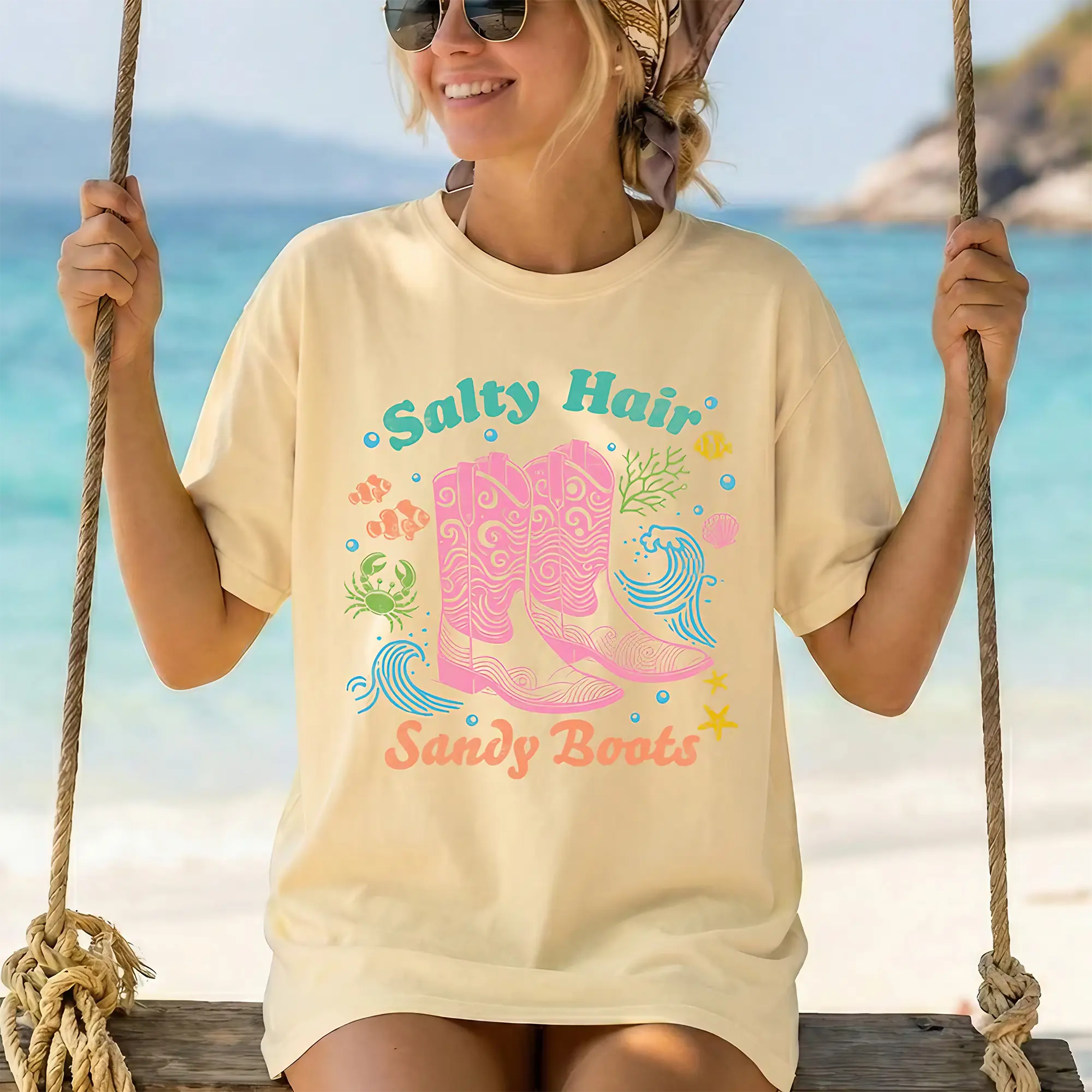 RodyThread Women's Oversized Coastal Cowgirl Graphic T-Shirt - Breathable Brown Basic Loose-Fit Top, Retro Western Beach Vacation Holiday Outfits with Salty Hair Sandy Boots Print, Preppy Aesthetic Summer Wrap Piece for Ocean Bikini Pairing