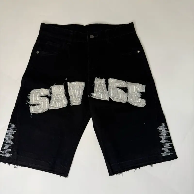 SAVAGE Black Shorts with Distressed Design and Bold "SAVAGE" Text