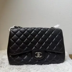 Pre-owned CHANEL Lambskin Crossbody Bags Black Jumbo Classic Flap Bag