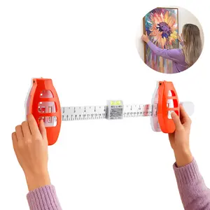 picture-hanging kit with a built-in level and ruler. Includes tools to hang your artwork precisely on the wall.