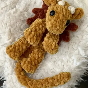 Crocheted mustard colored Onyx Storm inspired Dragon plushie