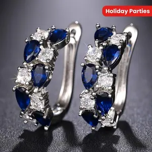Elegant vintage-style hoop earrings with synthetic blue sapphires — perfect for everyday wear and holiday parties