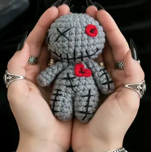 Little Amigurumi Voodoo Doll - Handmade Crochet Toy with Red Heart and Stitched Details for Collectors
