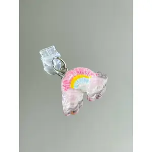 pastel rainbow charge port charm