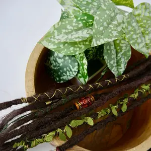 Boho Dreadlock Ponytail Extension with Green Leaf Accents and Beaded Decorations