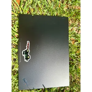 Green Tractor with Red Mower Sticker