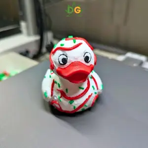 Christmas Cake Sprinkled Ducky - Festive Holiday Decorative Duck with Red Beak and Green Sprinkles