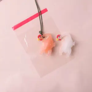 Car-mounted color-changing roasted chicken pendant, UV temperature-sensitive color-changing keychain, car interior decoration ornament