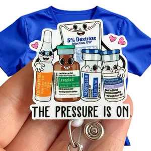 Glitter My Badge The pressure is on funny badge reel for nurse and hospital workers. Badge clip Badge pull - Retractable swivel clip with a 360 rotation. Great gift for coworker