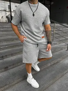 Men's Solid Color Textured Letter Patched Round Neck Tee & Drawstring Waist Shorts Two-Piece Set, Regular Fit Classic Casual Fashion Short Sleeve T-shirt & Pocket Track Shorts, Men's Summer Clothes for Daily Wear, Outfit, Menswear