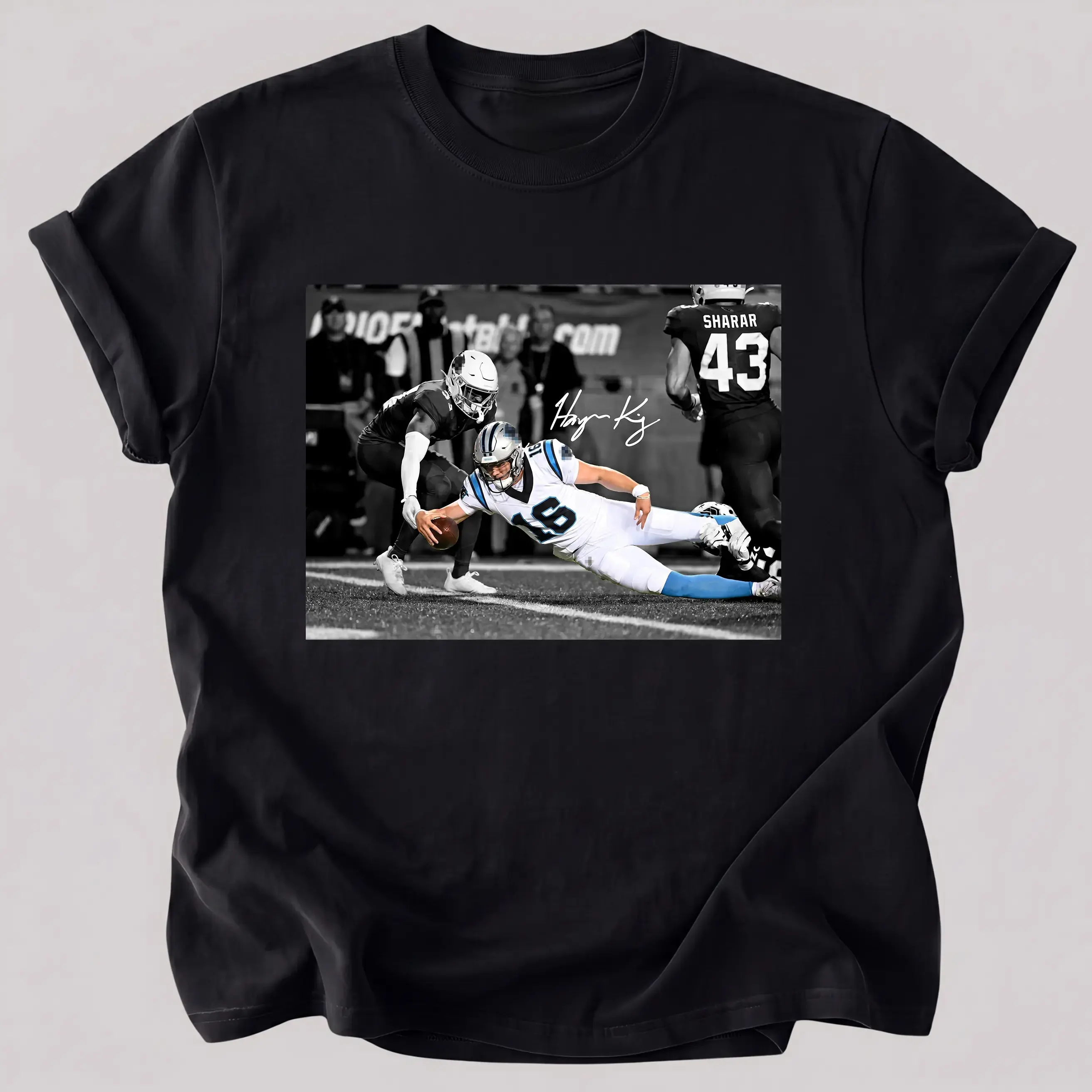 Crew‑neck short‑sleeve top printed with thrilling match snapshot of rugby athlete and autograph graphic, sports‑fan themed unisex everyday top