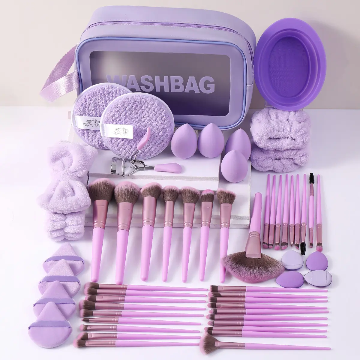 This is a cross-border best-selling Purple Makeup Kit, a complete set of beauty tools including makeup brushes, beauty blenders, cleaning tools, and a storage bag. It is a multi-piece combination, popular in Europe, America, and Southeast Asia, and a must