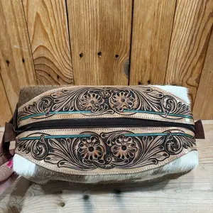 Cowhide/Tooled Makeup Bags!