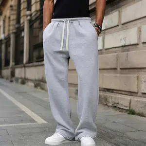 Men's loose-fit casual joggers with an adjustable drawstring waistband, suitable for gym workouts and autumn lounging. Breathable material and a relaxed fit.