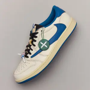 Jordan Men's 1 Retro Low OG SP Fragment x Travis Scott Sail Military Blue Basketball Shoes, from StockX