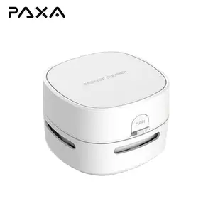 PAXA Desktop mini vacuum cleaner, equipped with a cleaning brush, with strong suction power and long-lasting battery life, suitable for desktop office use.