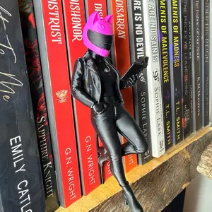 Bookshelf biker girl Statue