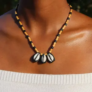 Nile Bazaar Triple Threat Necklace - Real Leather Backing Jewelry Unisex Boho Chic Cowrie Shell & Bead Necklace Coastal Beach & Unique Gift